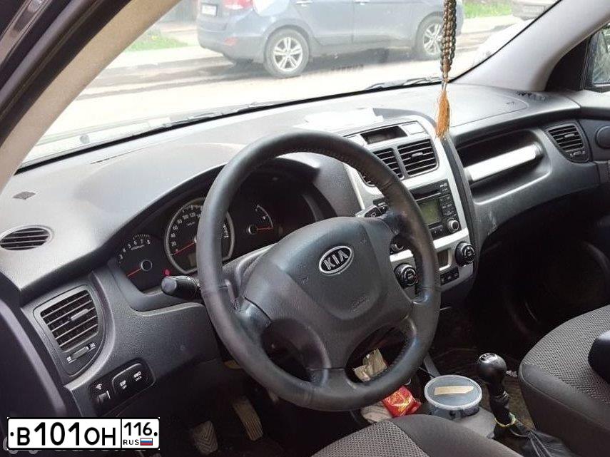 Фото автомобиля KIA SPORTAGE, 2010 — госномер Н889ТЕ716. Цвет: СЕРЫЙ
