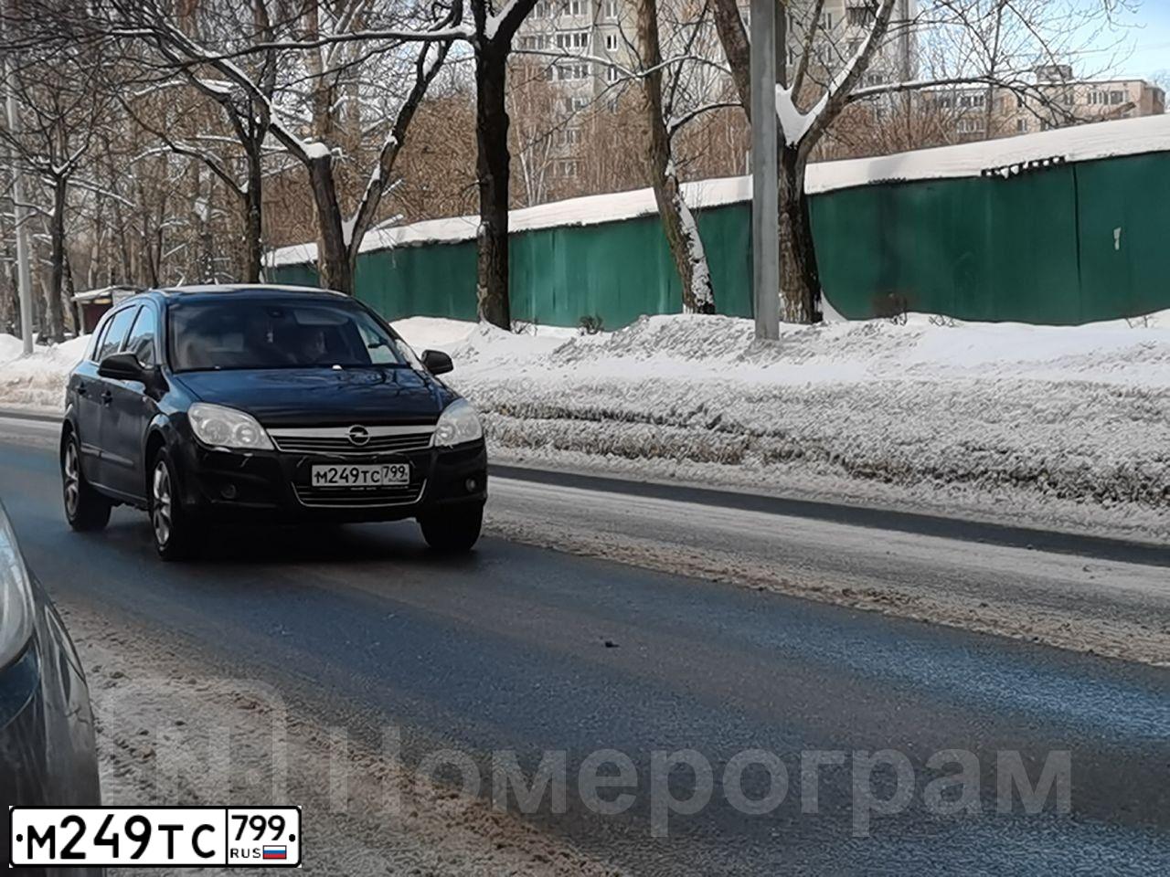 Фото автомобиля OPEL ASTRA, 2014 — госномер М249ТС799. Цвет: ЧЕРНЫЙ