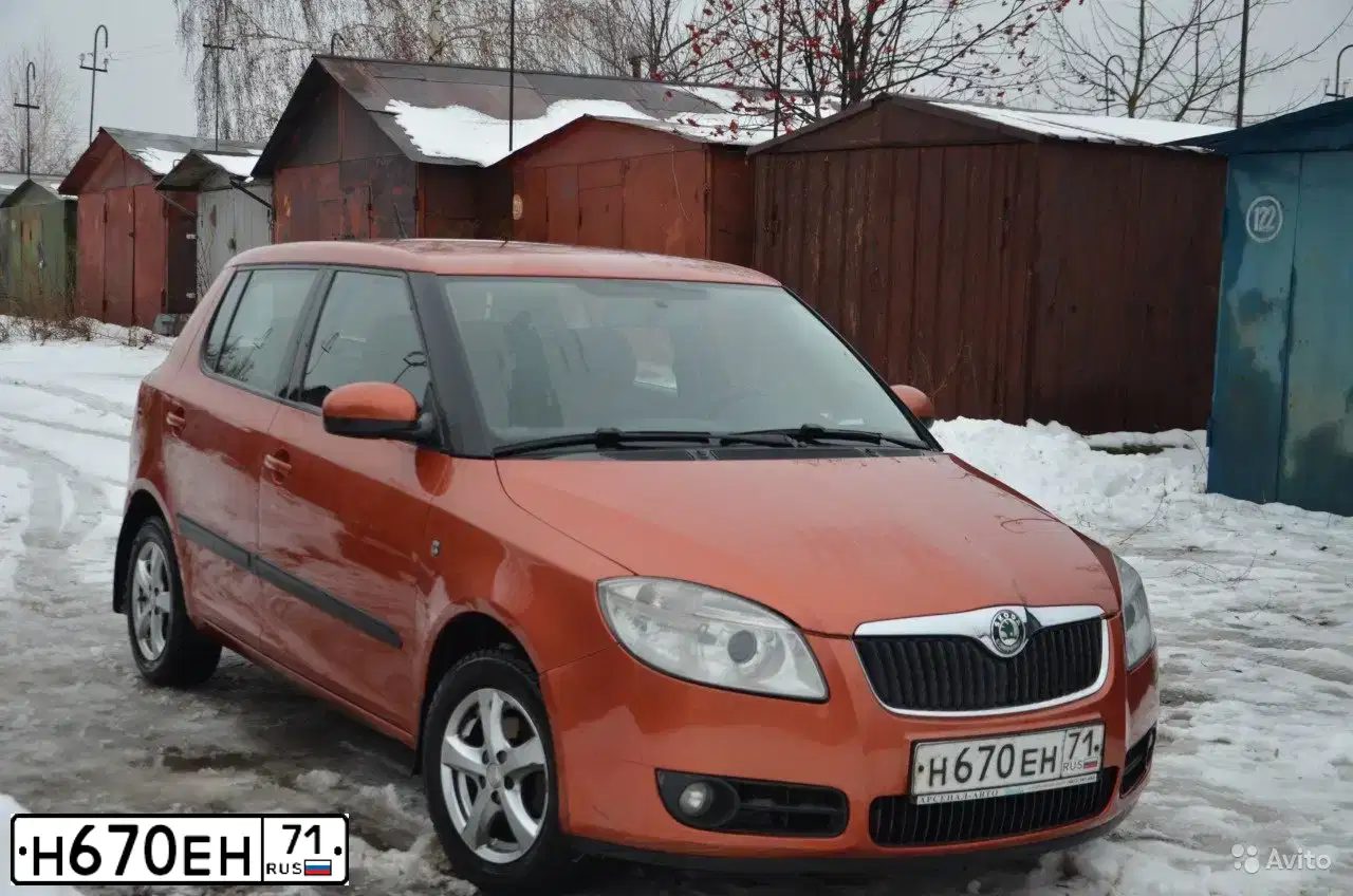 Фото автомобиля SKODA FABIA, 2008 — госномер Н670ЕН71. Цвет: ОРАНЖЕВО-КРАСНЫЙ