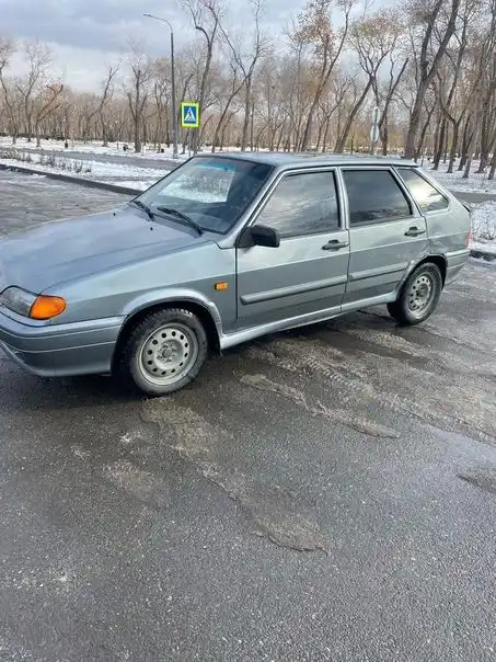 Фото автомобиля LADA 2114 SAMARA, 2011 — госномер Н602СЕ702. Цвет: средний серо-зеленый металлик