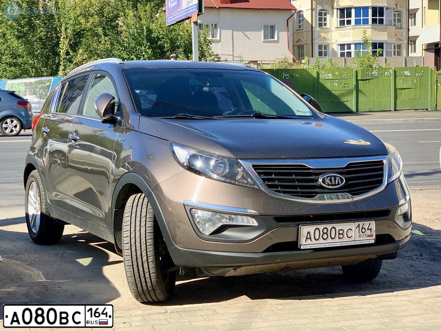 Фото автомобиля KIA SPORTAGE, 2010 — госномер А080ВС164. Цвет: Коричневый