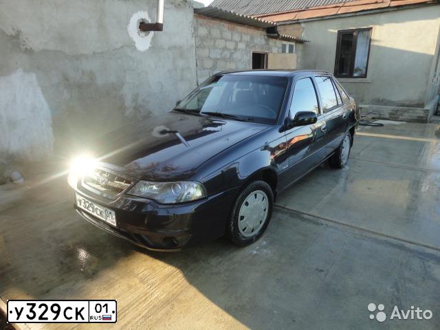 Фото автомобиля DAEWOO NEXIA, 2009 — госномер У329СК01. Цвет: Темно-синий