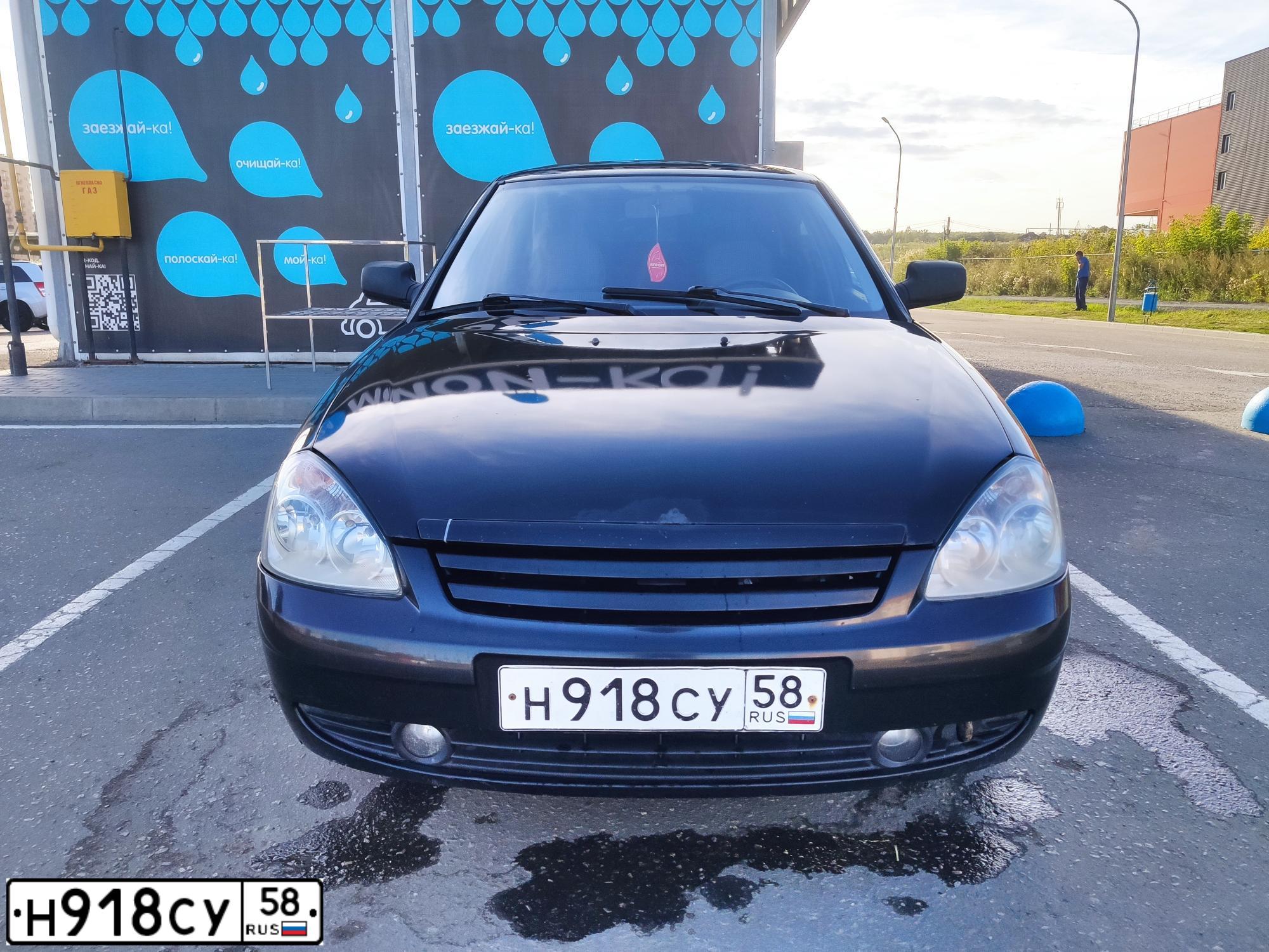 Фото автомобиля LADA 2172 PRIORA, 2009 — госномер Т100ХМ58. Цвет: Сине-Черный