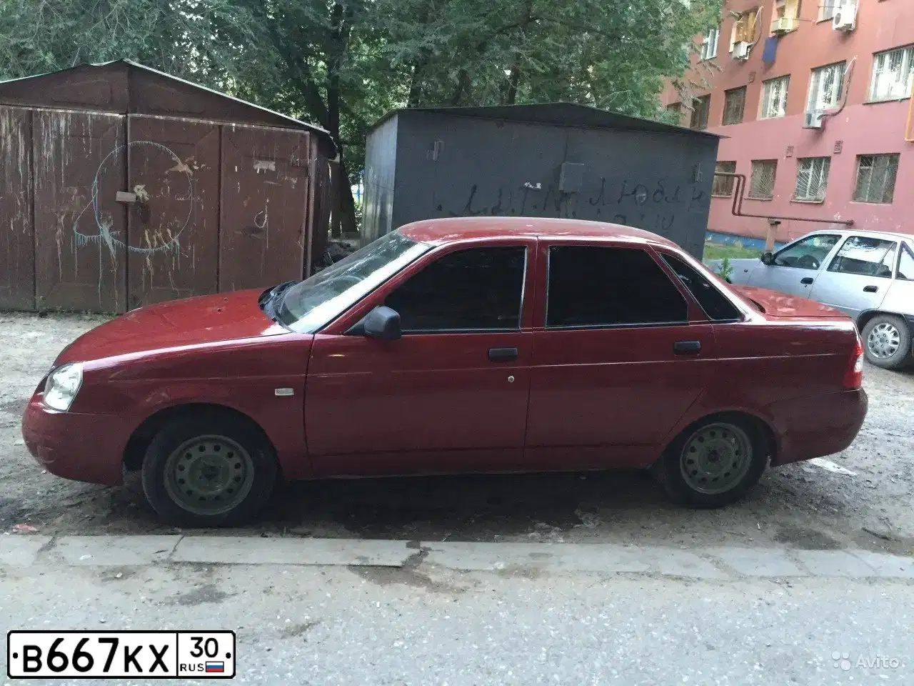 Фото автомобиля LADA 2170 PRIORA, 2007 — госномер В667КХ30. Цвет: КРАСНЫЙ