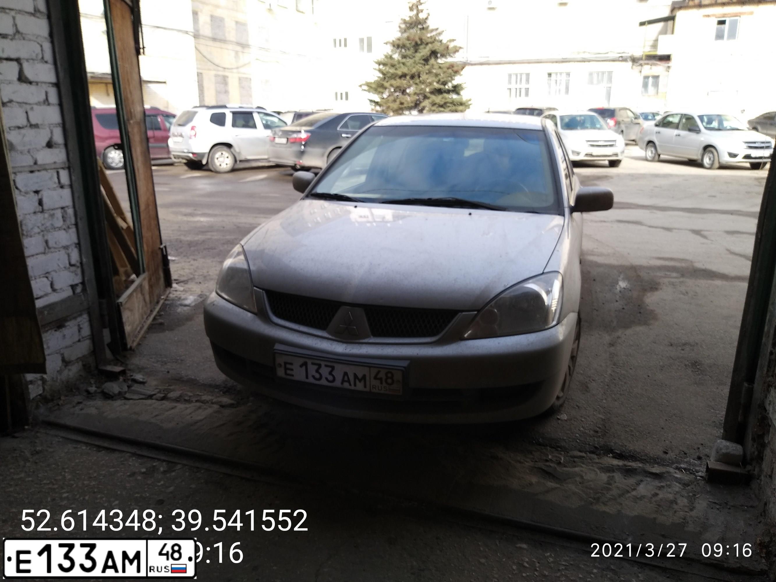 Фото автомобиля MITSUBISHI LANCER, 2005 — госномер Е133АМ48. Цвет: СЕРЕБРИСТЫЙ