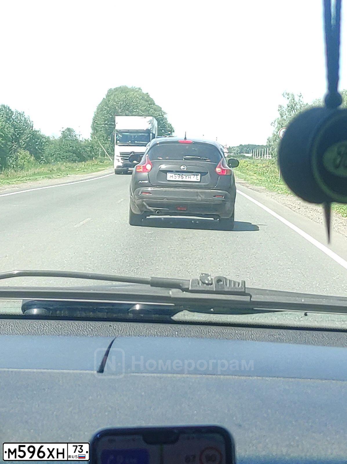 Фото автомобиля NISSAN JUKE, 2011 — госномер М596ХН73. Цвет: ЧЕРНЫЙ