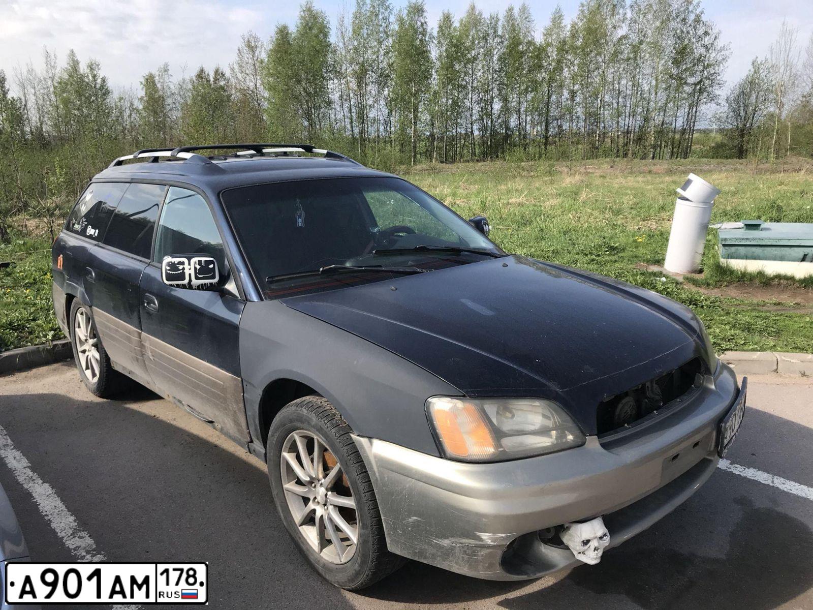 Фото автомобиля SUBARU OUTBACK, 2000 — госномер Е400ЕХ198. Цвет: ТЕМНО-СИНИЙ