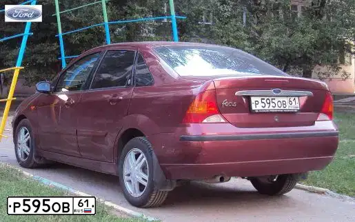 Фото автомобиля FORD FOCUS, 2003 — госномер Н297РР82. Цвет: ВИШНЕВЫЙ