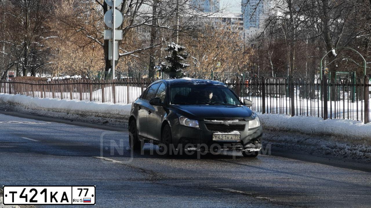 Фото автомобиля CHEVROLET CRUZE, 2010 — госномер Т421КА77. Цвет: ЧЕРНЫЙ