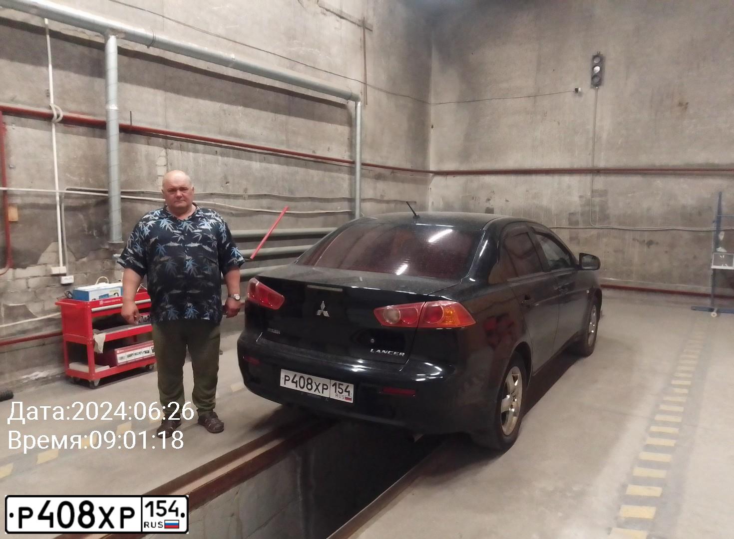 Фото автомобиля MITSUBISHI LANCER, 2008 — госномер К141МТ122. Цвет: ЧЕРНЫЙ