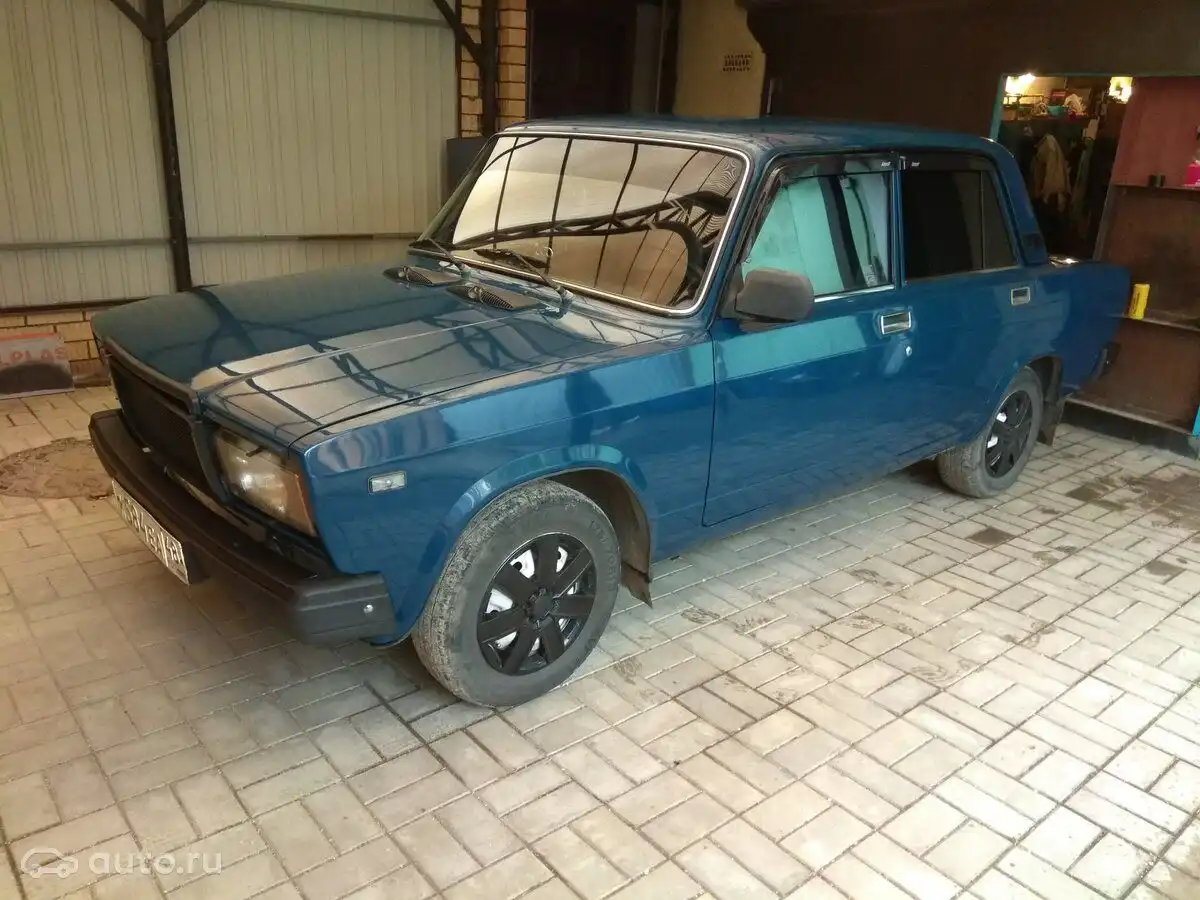 Фото автомобиля LADA 2190 GRANTA, 2013 — госномер Е500КР750. Цвет: ТЕМНО-ВИШНЕВЫЙ