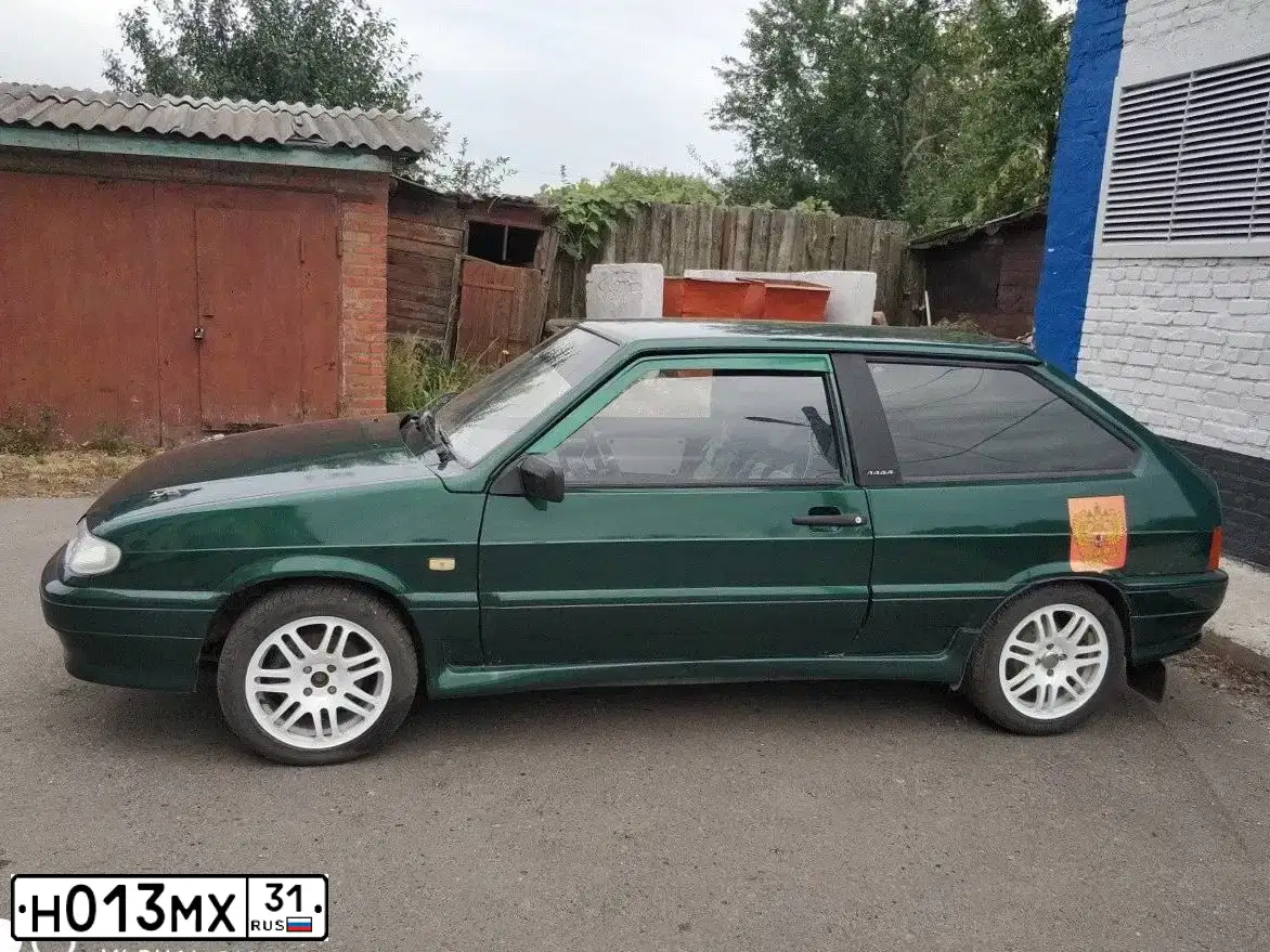Фото автомобиля LADA 2108 SAMARA, 1997 — госномер Н013МХ31. Цвет: ЗЕЛЕНЫЙ