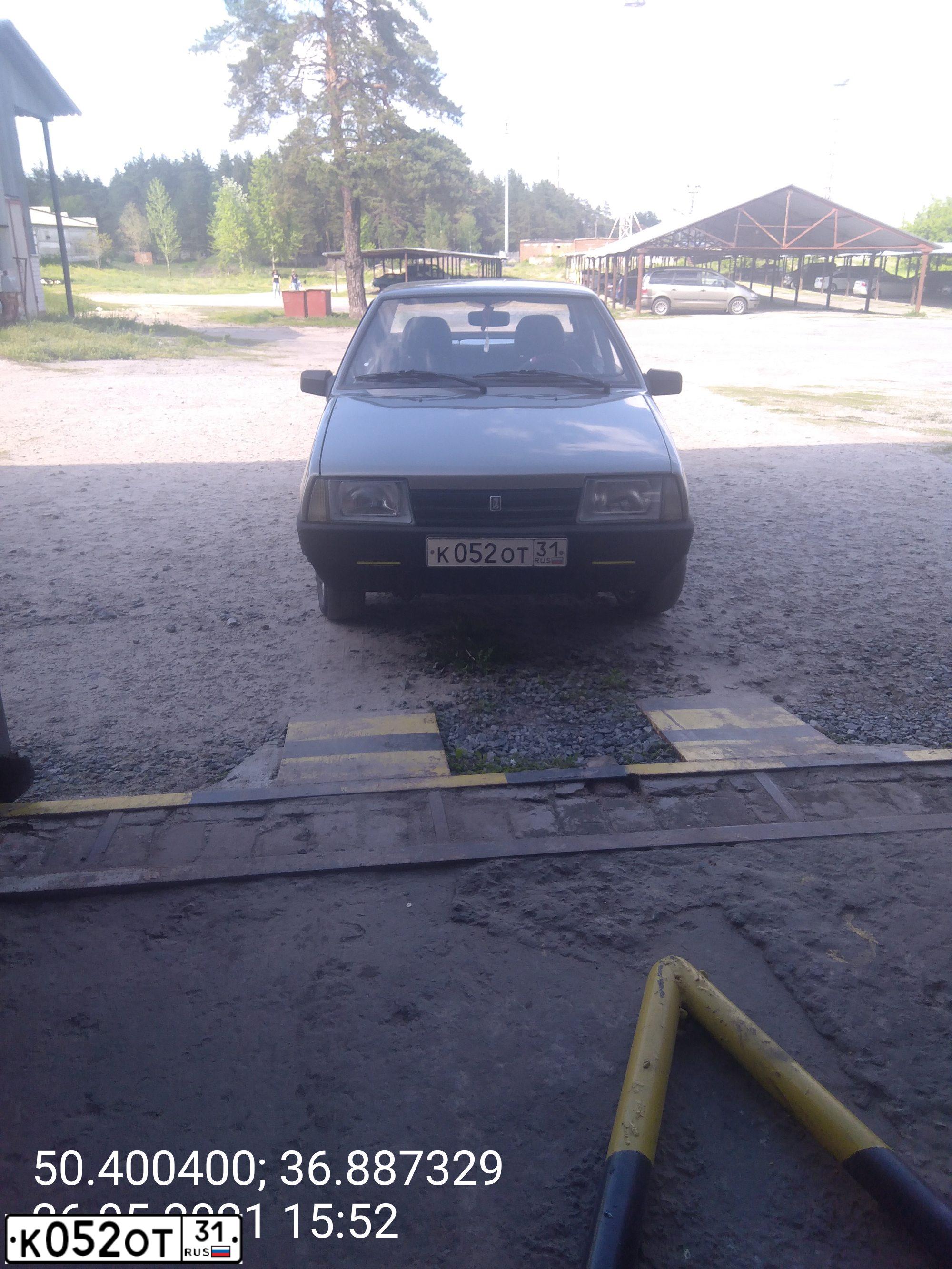 Фото автомобиля LADA 2109 SAMARA, 2001 — госномер К052ОТ31. Цвет: СЕРЕБРИСТЫЙ СЕРО-ЗЕЛЕНЫЙ