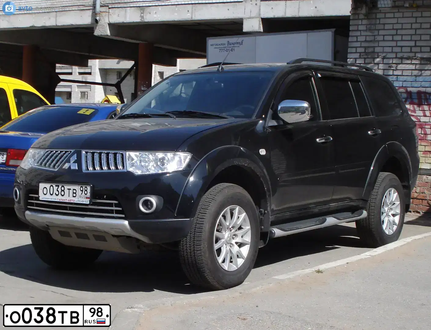 Фото автомобиля MITSUBISHI PAJERO SPORT, 2010 — госномер М765ХК10. Цвет: ЧЕРНЫЙ