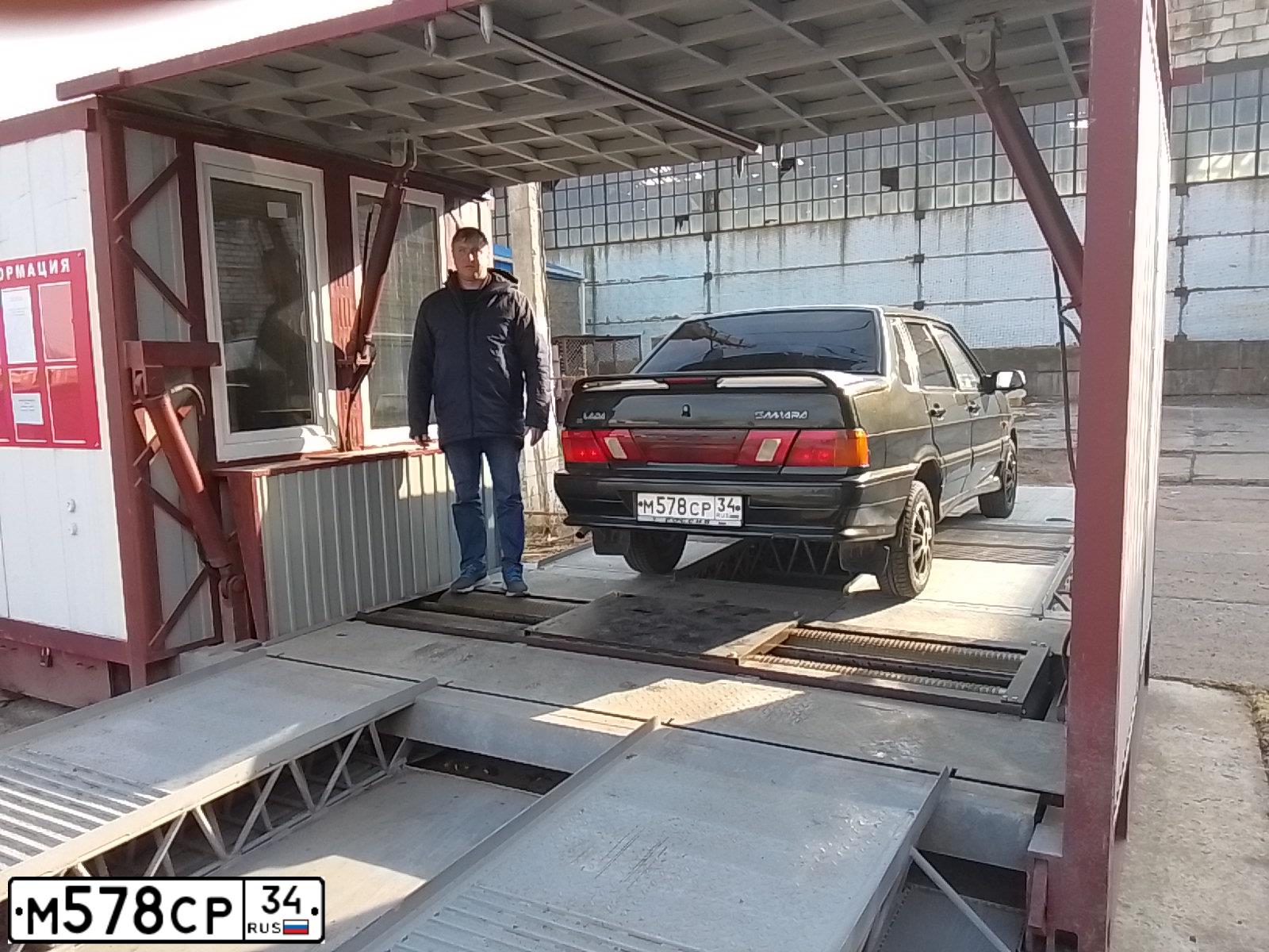Фото автомобиля LADA 2115 SAMARA, 2005 — госномер К019НО30. Цвет: ЗОЛОТИСТЫЙ ТЕМНО-ЗЕЛЕНЫЙ