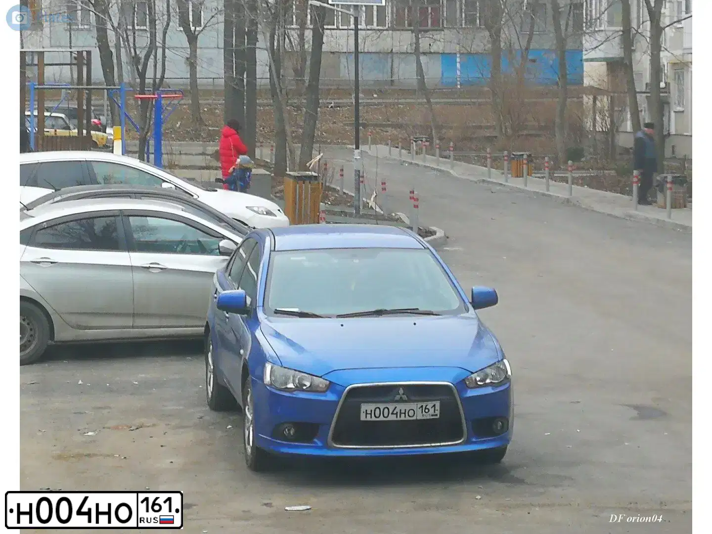 Фото автомобиля MITSUBISHI LANCER, 2011 — госномер Н004НО161. Цвет: СИНИЙ