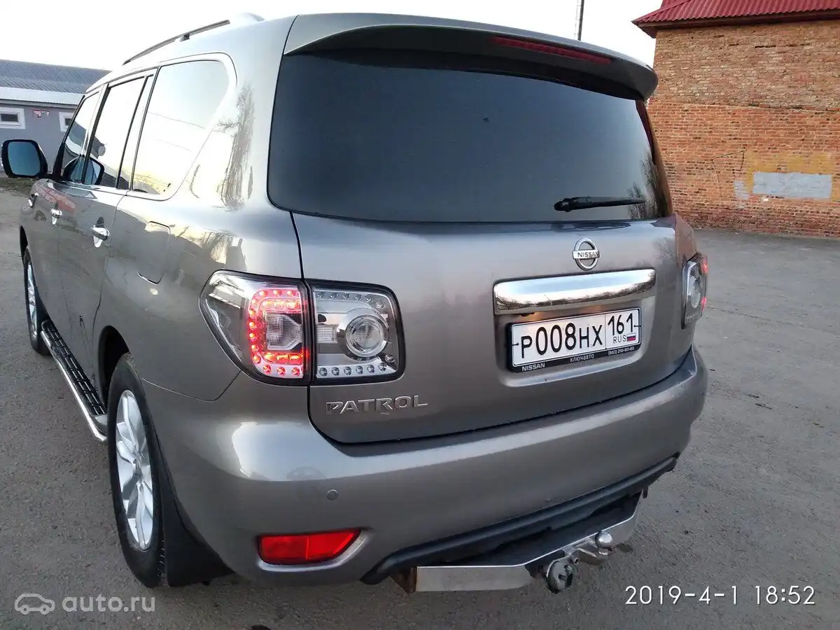 Фото автомобиля TOYOTA LANDCRUISER, 1999 — госномер Р008НХ161. Цвет: БЕЛЫЙ