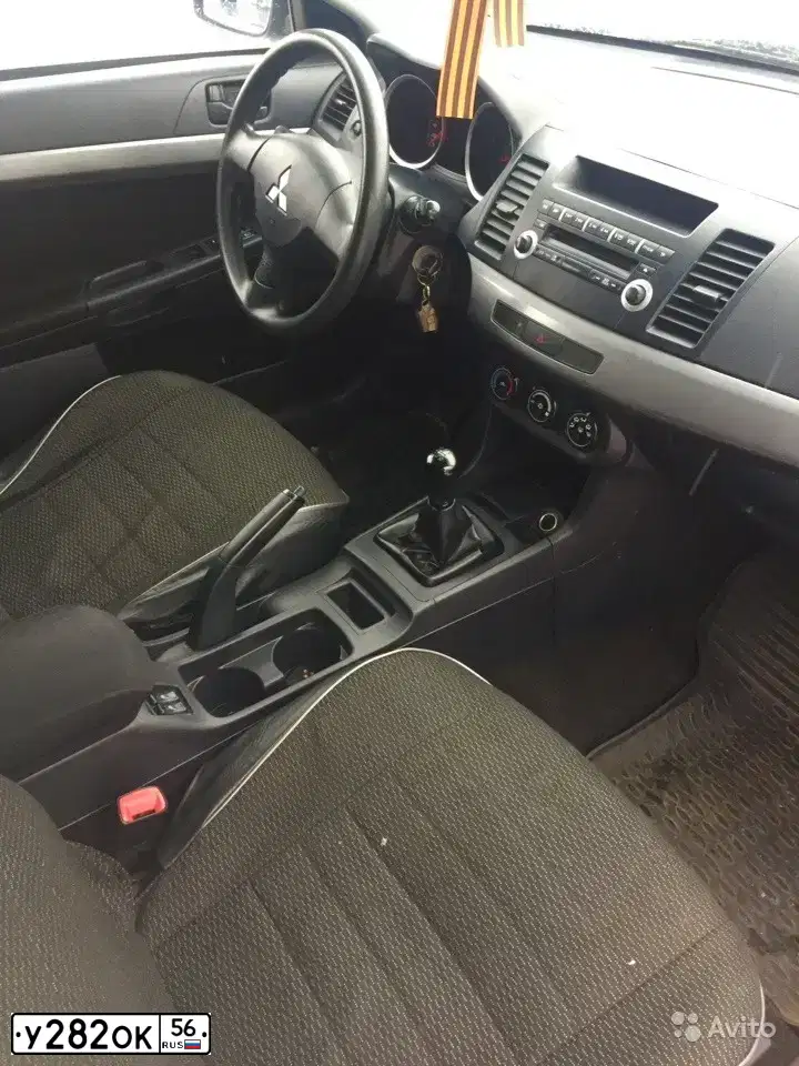 Фото автомобиля MITSUBISHI LANCER, 2007 — госномер М230УА75. Цвет: синий