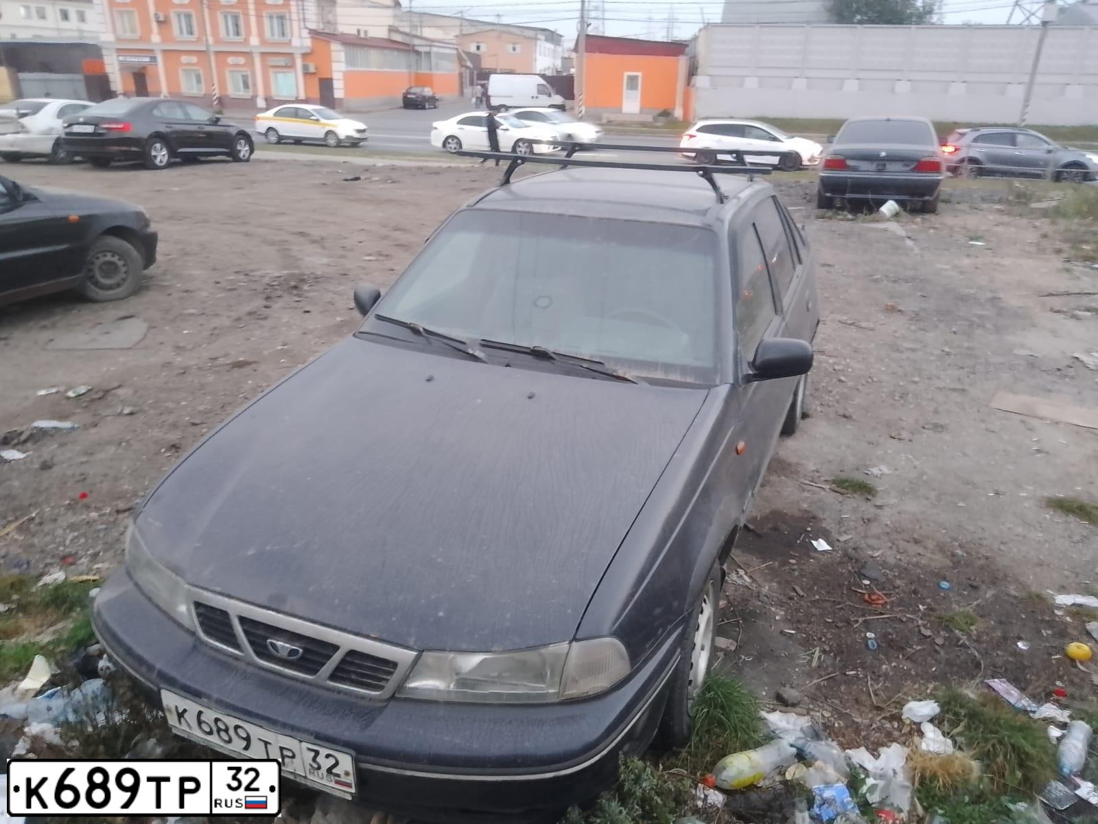 Фото автомобиля FORD FOCUS C-MAX, 2005 — госномер К698ТР32. Цвет: ТЕМНО-ЗЕЛЕНЫЙ