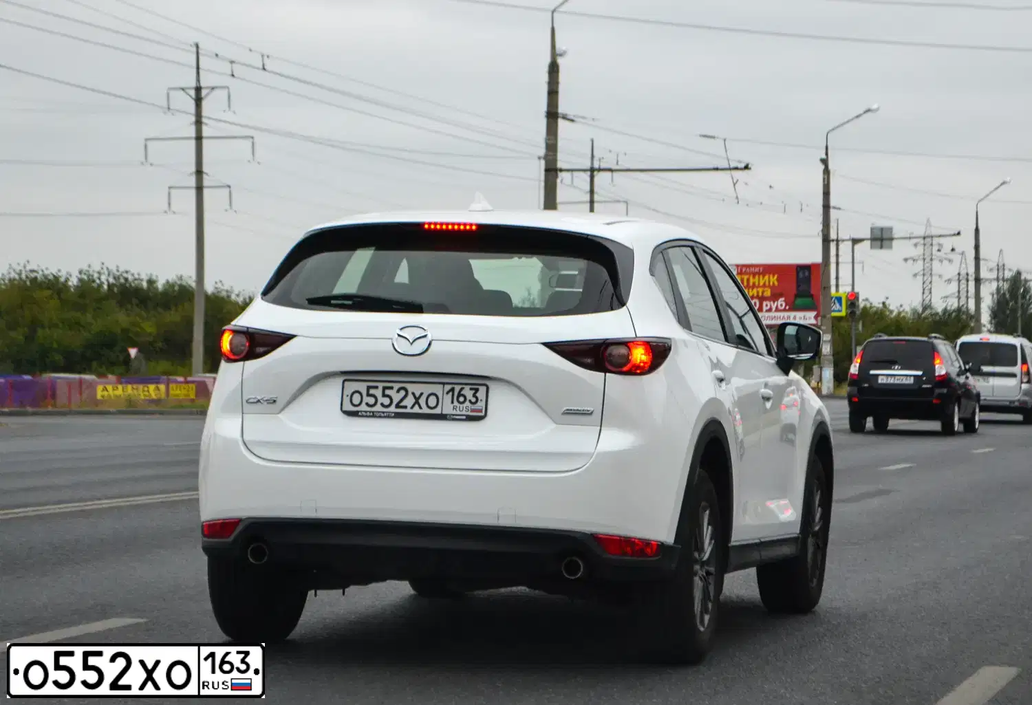Фото автомобиля FORD FOCUS, 2011 — госномер М702НА716. Цвет: Красный
