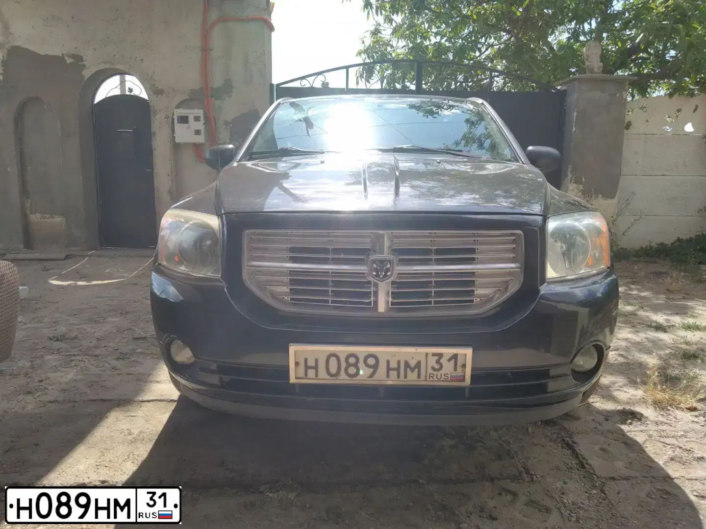 Фото автомобиля DODGE CALIBER, 2011 — госномер Е844ХР82. Цвет: ЧЕРНЫЙ