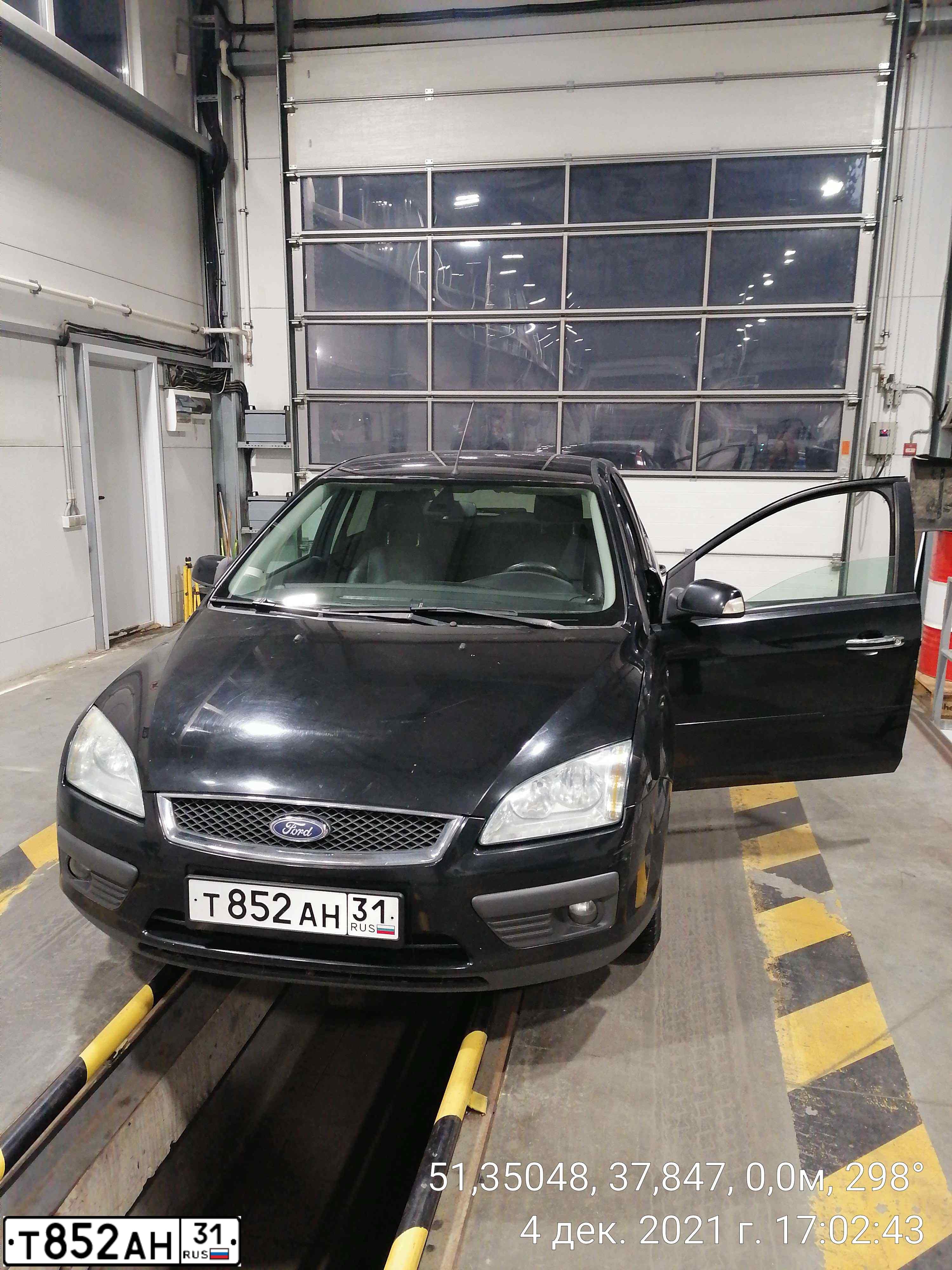 Фото автомобиля FORD D FOCUS, 2007 — госномер Т852АН31. Цвет: ЧЕРНЫЙ