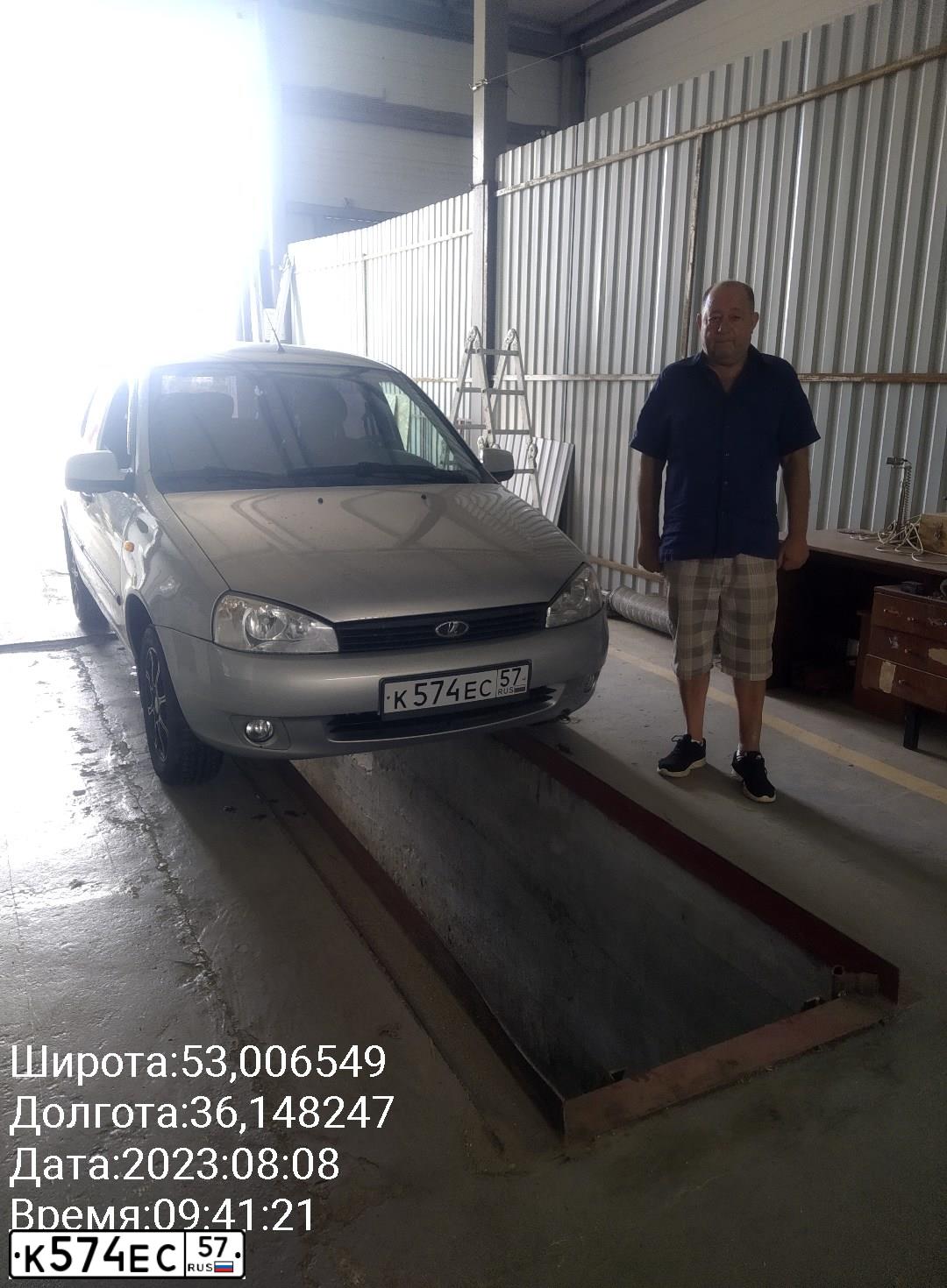 Фото автомобиля LADA 1119 KALINA, 2012 — госномер К574ЕС57. Цвет: Серый