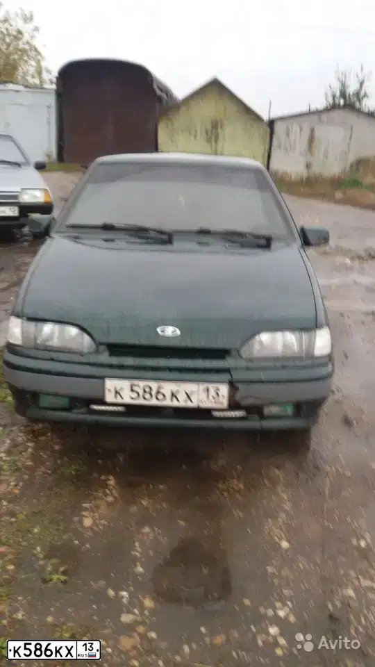 Фото автомобиля LADA 2115 SAMARA, 2004 — госномер К586КХ13. Цвет: ТЕМНО-ЗЕЛЕНЫЙ