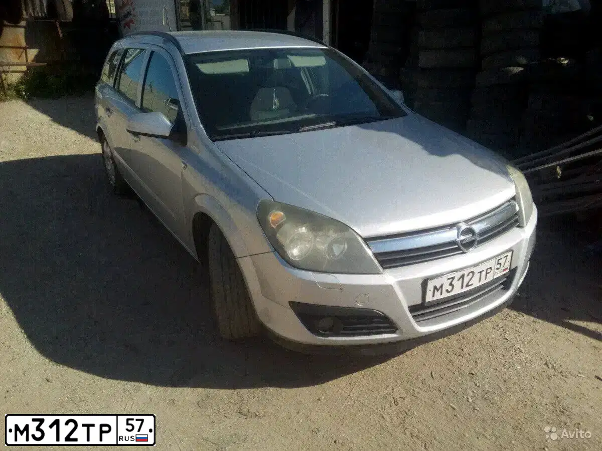 Фото автомобиля OPEL ASTRA, 2006 — госномер М312ТР57. Цвет: БЕЛЫЙ СЕРЕБРИСТЫЙ