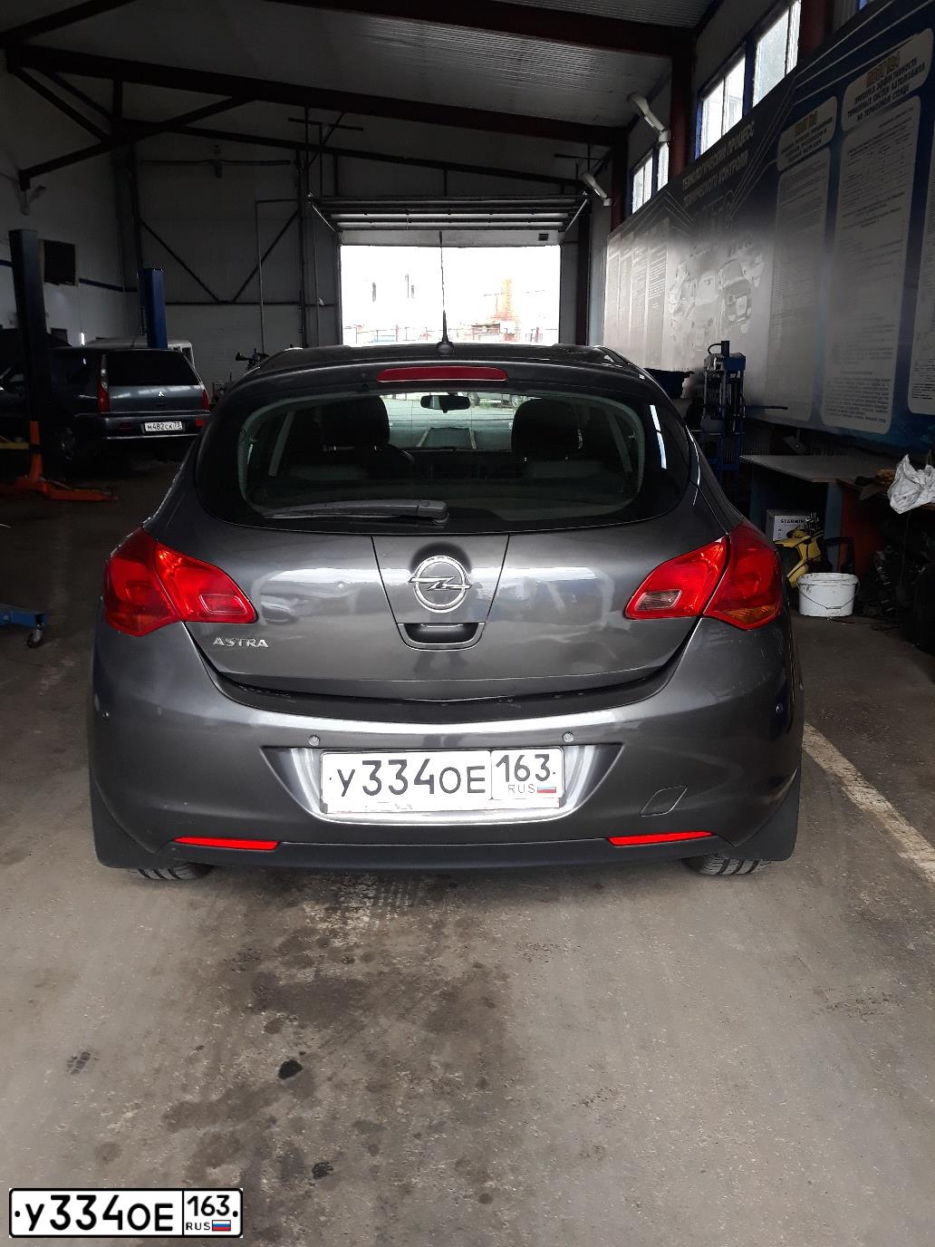 Фото автомобиля OPEL ASTRA, 2010 — госномер М123ТМ73. Цвет: СЕРЫЙ МЕТАЛЛИК