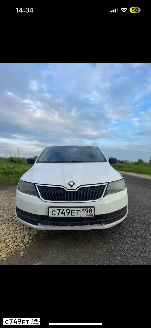 Фото автомобиля SKODA RAPID, 2015 — госномер С749ЕТ198. Цвет: БЕЛЫЙ
