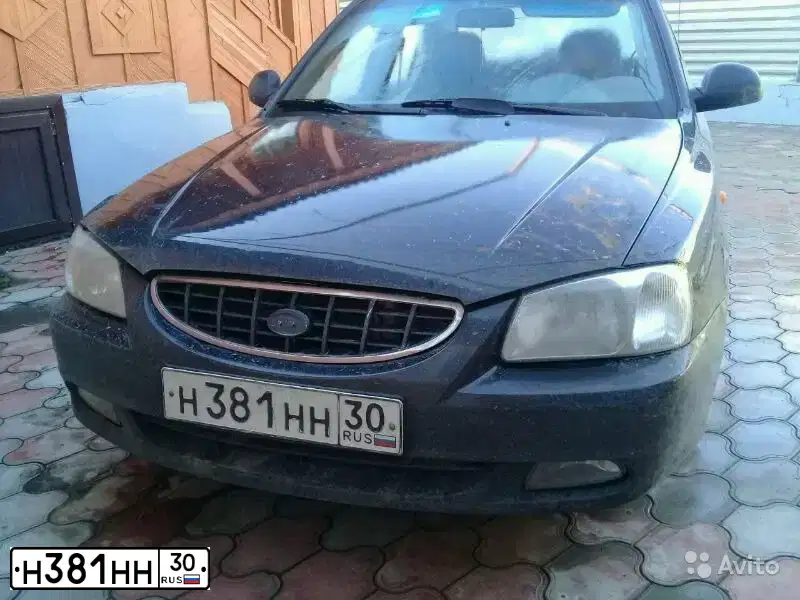 Фото автомобиля LADA 2121 NIVA, 2007 — госномер Н384НН30. Цвет: ЯРКО-БЕЛЫЙ