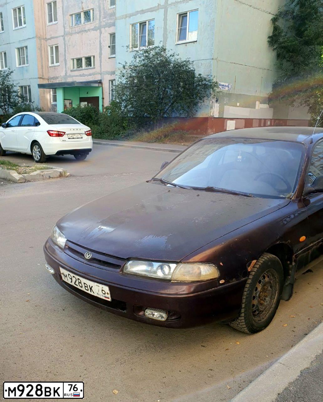 Фото автомобиля MAZDA 626, 1993 — госномер М928ВК76. Цвет: ТЕМНО-БОРДОВЫЙ