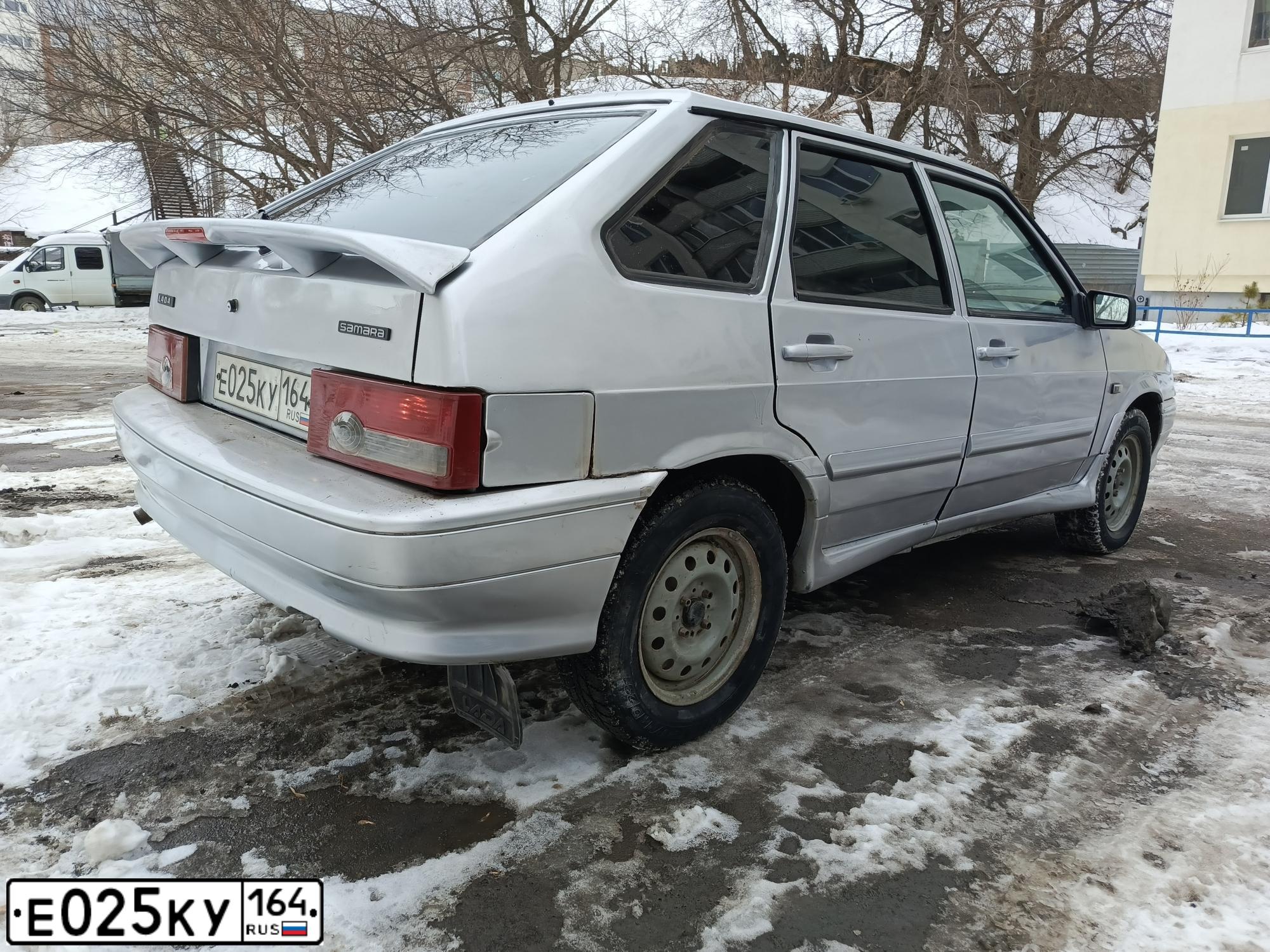 Фото автомобиля LADA 2114 SAMARA, 2008 — госномер Е025КУ164. Цвет: СЕРЫЙ