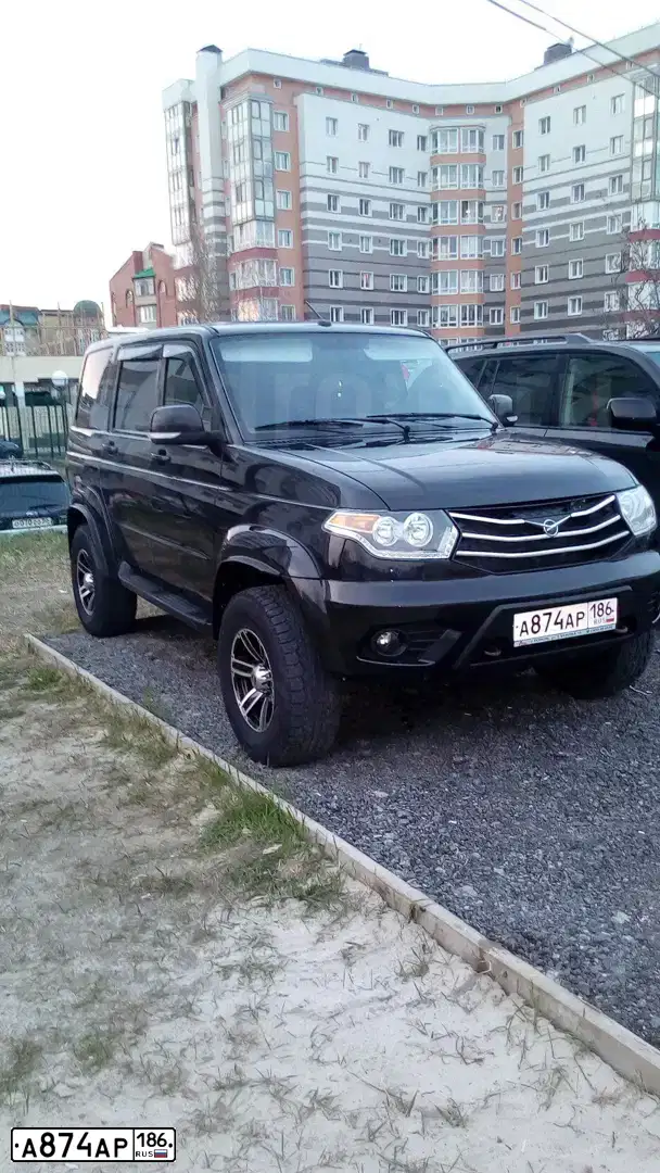 Фото автомобиля UAZ 3163 PATRIOT, 2015 — госномер А874АР186. Цвет: АВАНТЮРИН МЕТАЛЛИК