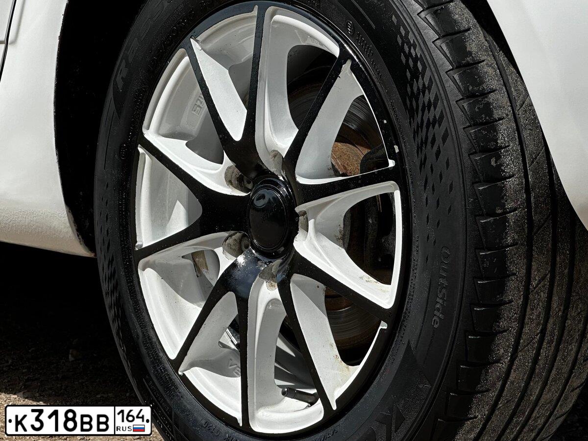 Фото автомобиля OPEL ASTRA, 2012 — госномер К318ВВ164. Цвет: Белый
