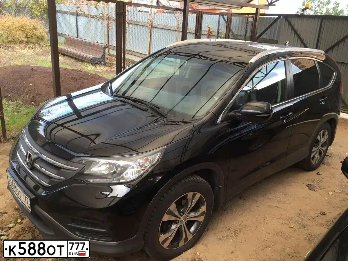 Фото автомобиля TOYOTA CAMRY, 2015 — госномер К588ОТ777. Цвет: СЕРЫЙ