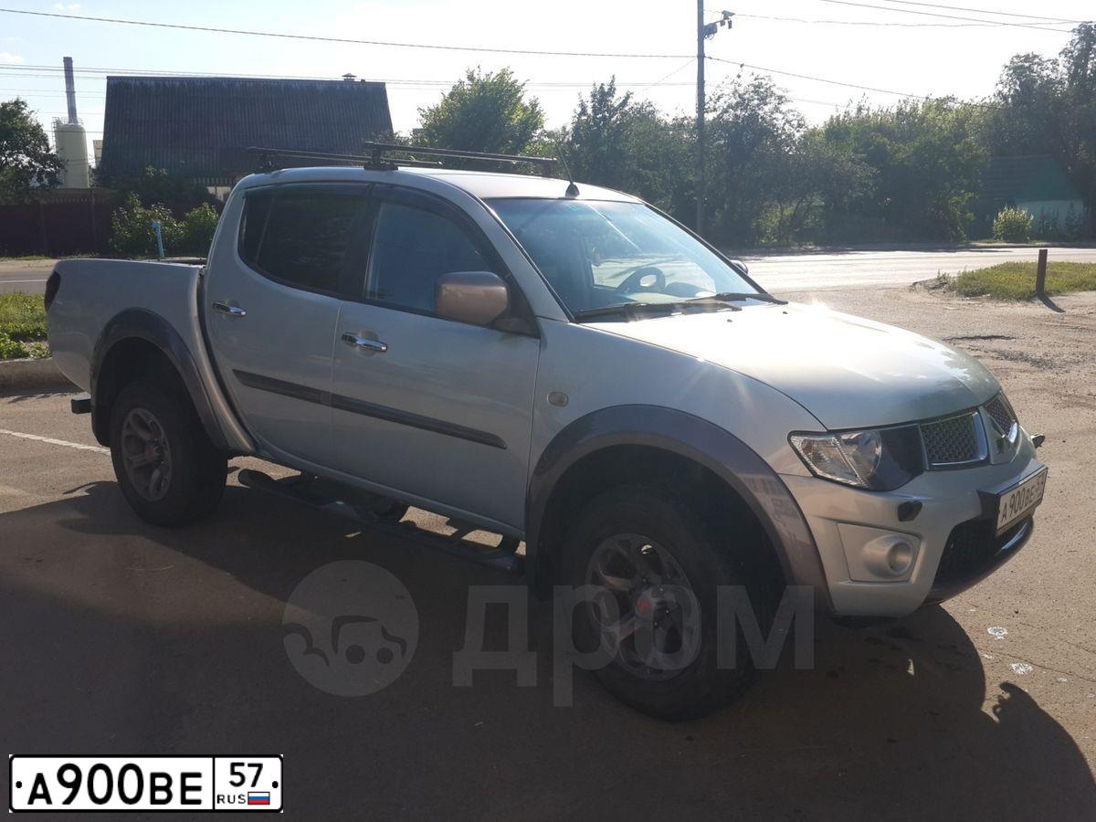 Фото автомобиля UAZ 3163 PATRIOT, 2013 — госномер В556ВС57. Цвет: Серебристо-желтый металлик