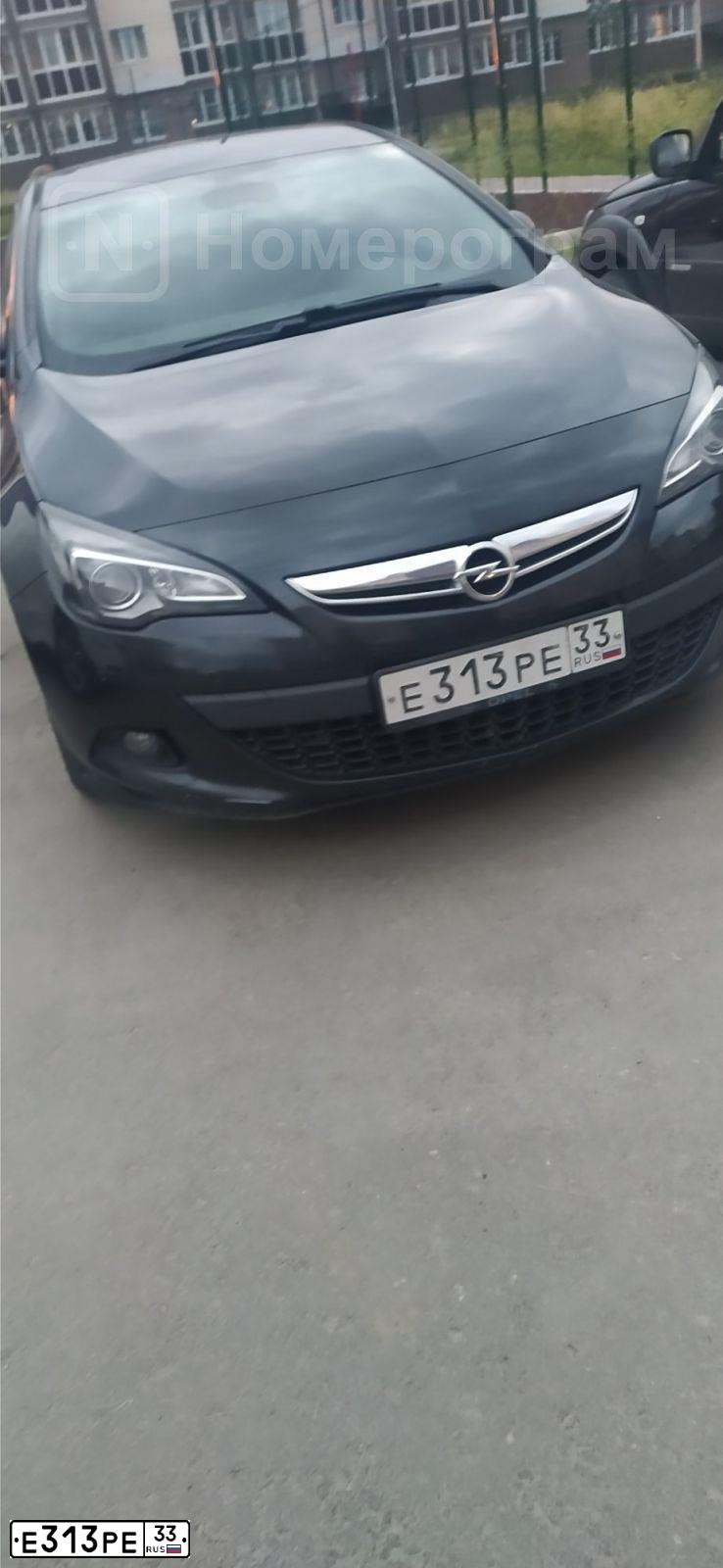 Фото автомобиля OPEL ASTRA, 2012 — госномер Е313РЕ33. Цвет: ЧЕРНЫЙ