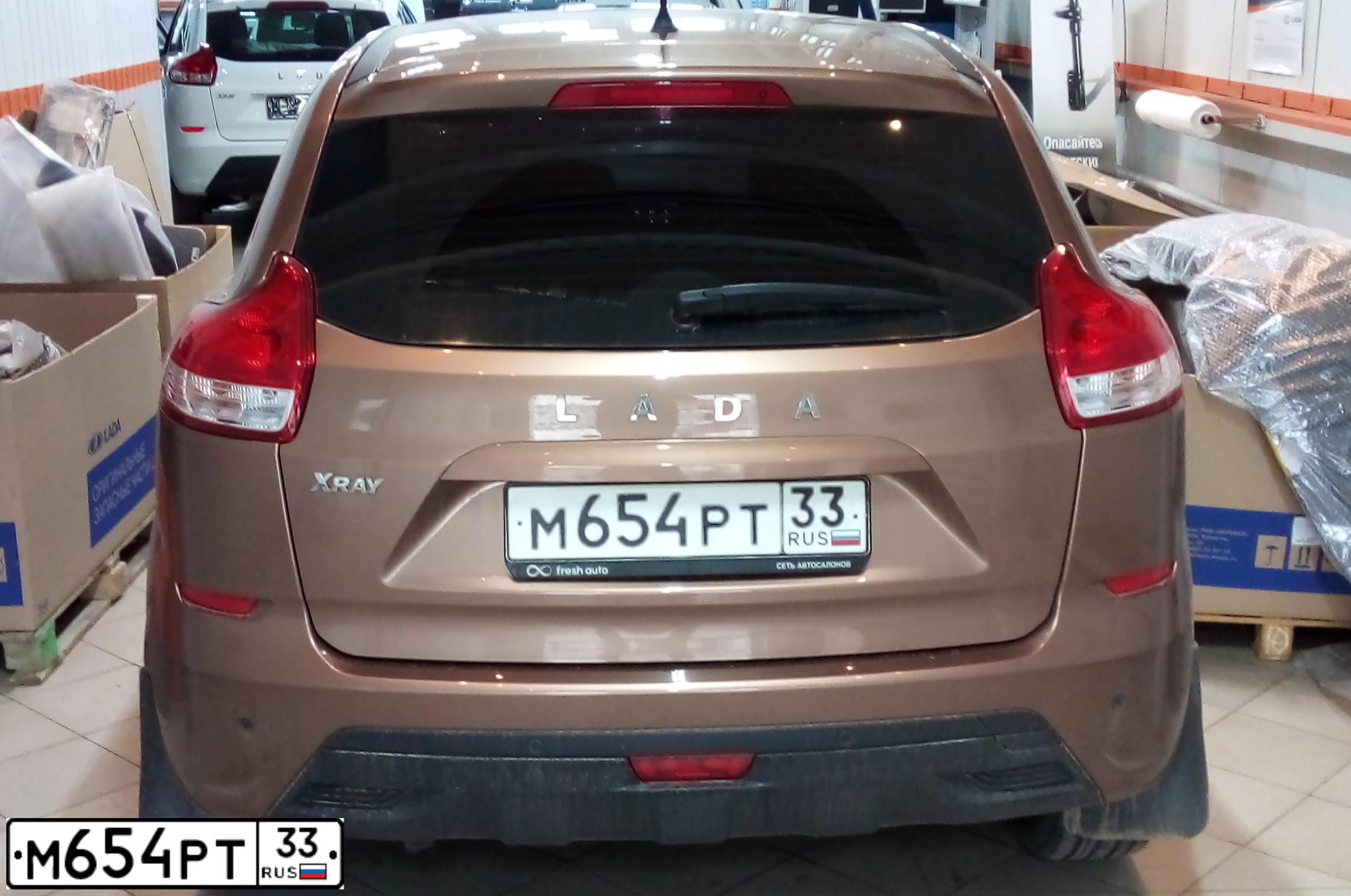 Фото автомобиля LADA XRAY, 2016 — госномер М654РТ33. Цвет: СВЕТЛО-КОРИЧНЕВЫЙ