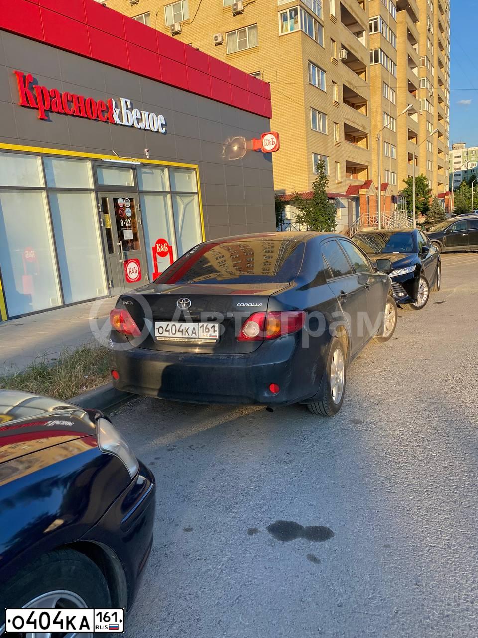 Фото автомобиля TOYOTA COROLLA, 2008 — госномер О404КА161. Цвет: ЧЕРНЫЙ