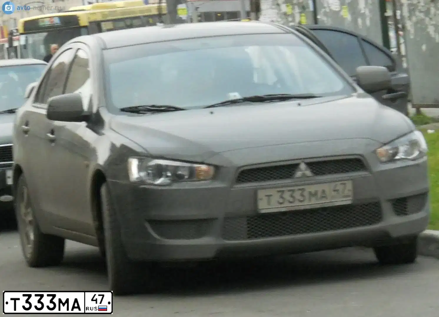 Фото автомобиля MITSUBISHI LANCER, 2010 — госномер Т333МА47. Цвет: ЧЕРНЫЙ