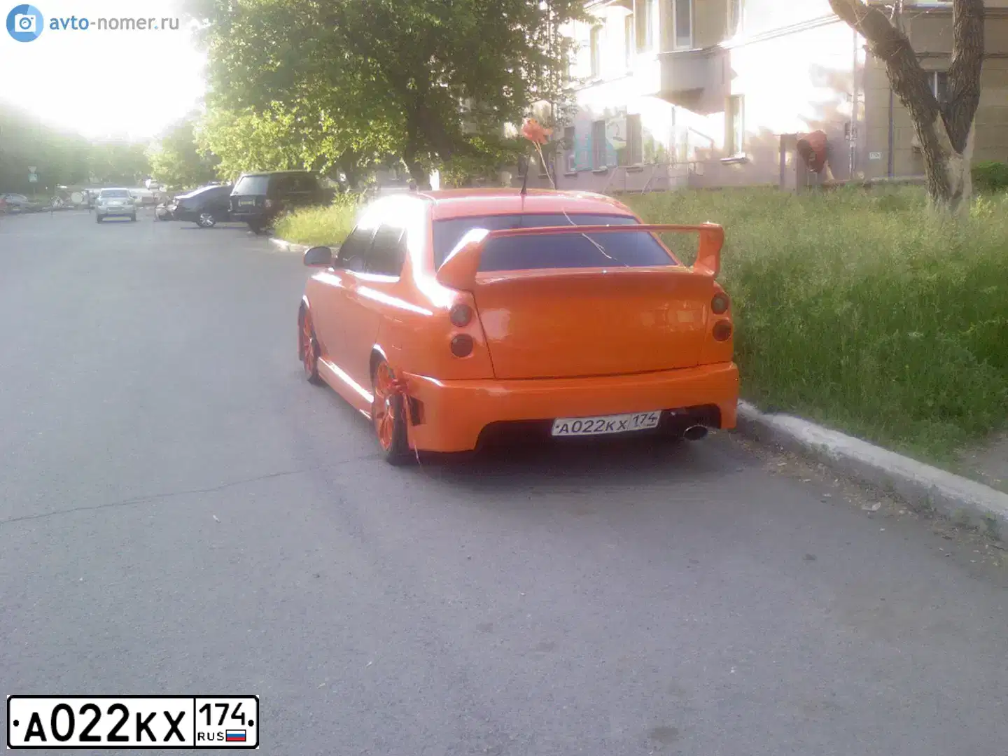 Фото автомобиля TAGAZ ACCENT, 2006 — госномер А022КХ174. Цвет: ОРАНЖЕВЫЙ