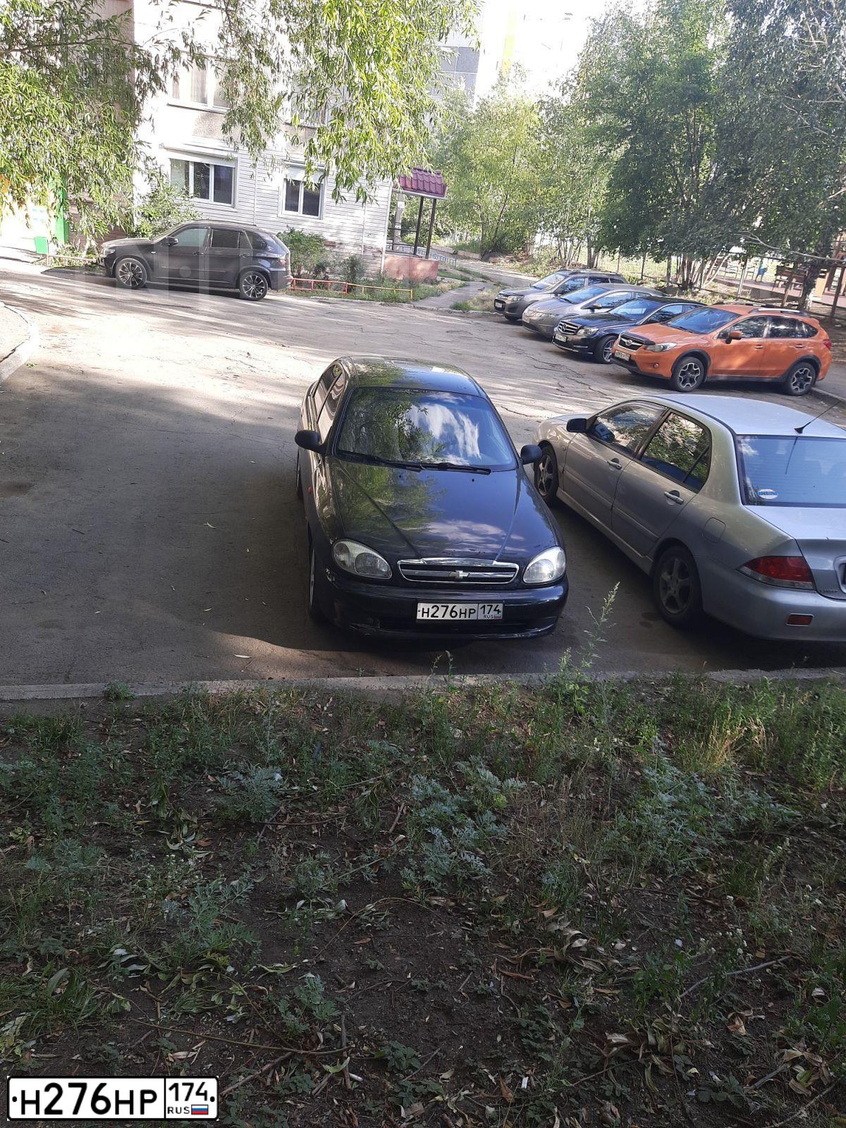 Фото автомобиля CHEVROLET СНЕVRОLЕТLАNОS, 2007 — госномер Н276НР174. Цвет: ЧЕРНЫЙ
