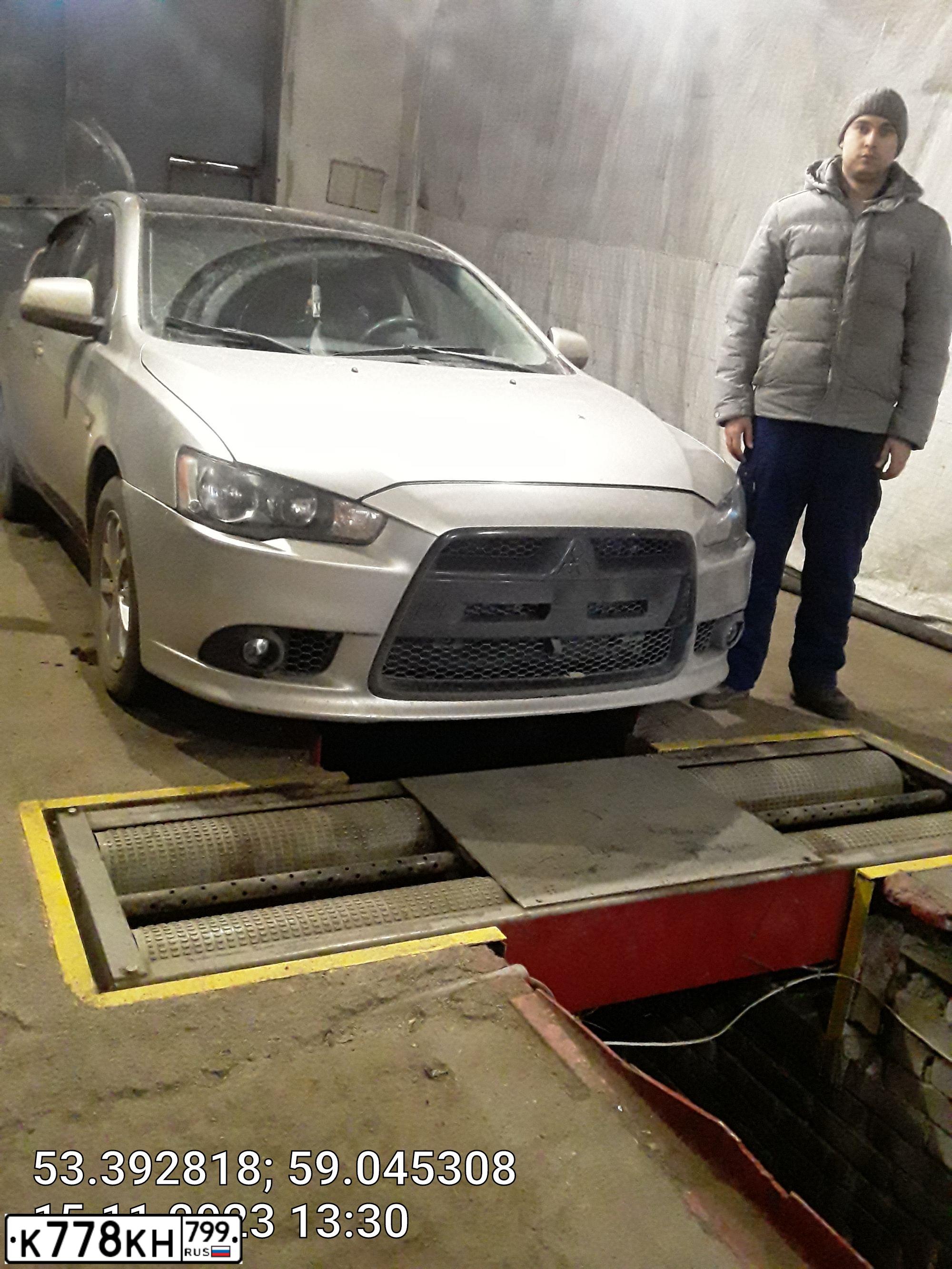 Фото автомобиля MITSUBISHI LANCER, 2012 — госномер К300ВО50. Цвет: Серый