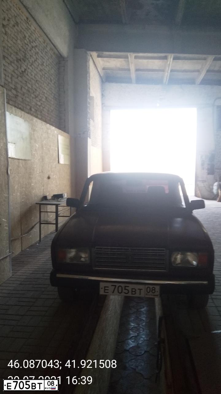 Фото автомобиля LADA 2107, 2003 — госномер Е705ВТ08. Цвет: ТЕМНО-БОРДОВЫЙ