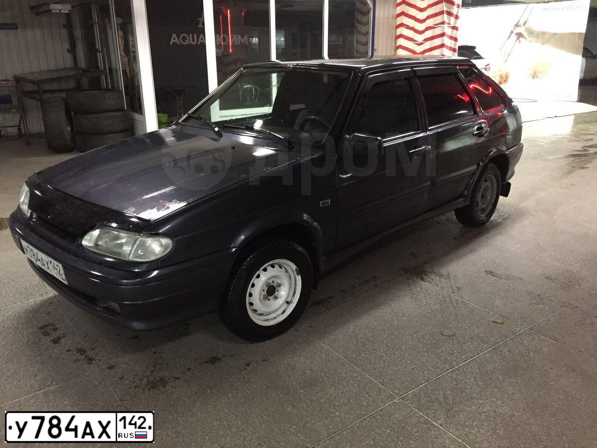 Фото автомобиля RENAULT DUSTER, 2012 — госномер Е187АХ122. Цвет: Коричневый