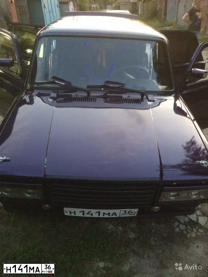 Фото автомобиля LADA 2107 LADA, 2004 — госномер Н141МА36. Цвет: ФИОЛЕТОВЫЙ