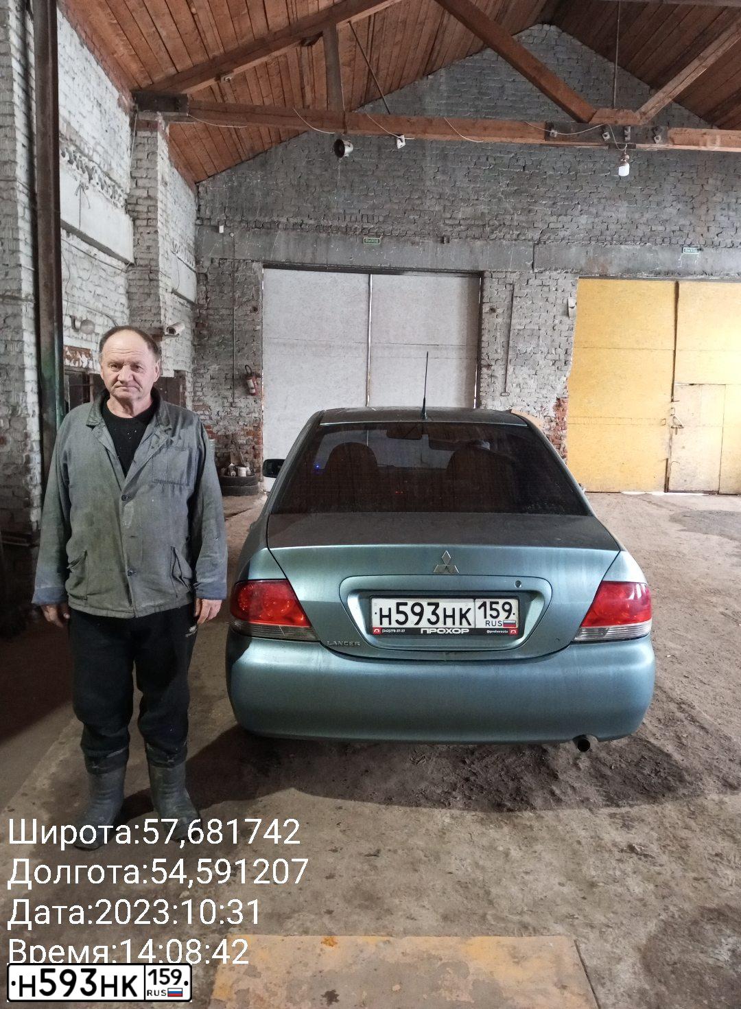 Фото автомобиля MITSUBISHI LANCER, 2006 — госномер Х503АМ59. Цвет: СВЕТЛО СЕРО-ЗЕЛЕНЫЙ