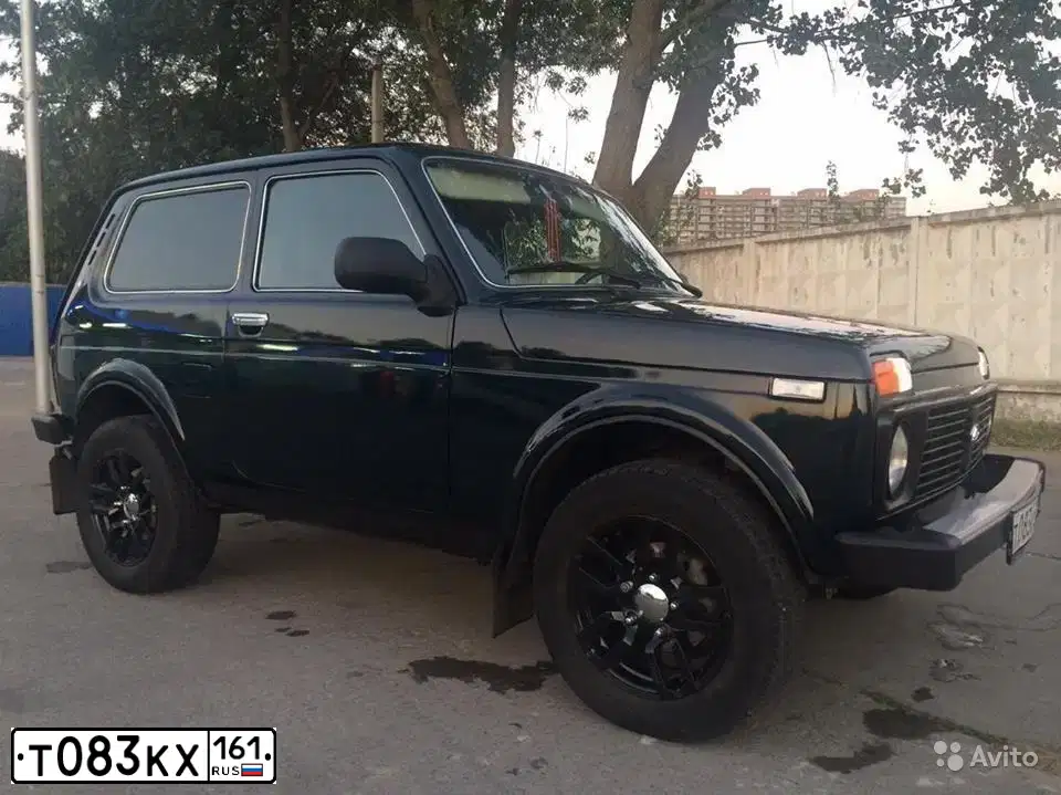 Фото автомобиля LADA 2121 NIVA, 2013 — госномер Т063КХ161. Цвет: Темно-зеленый